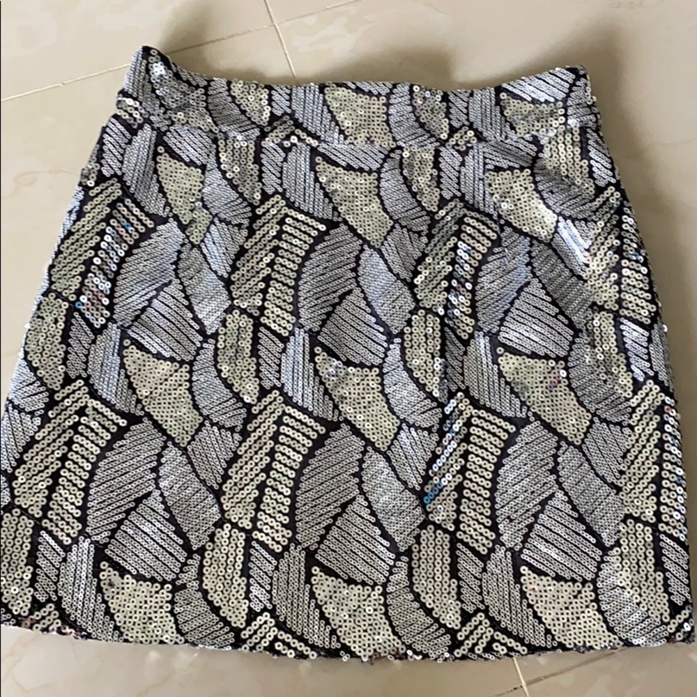 Paillette mini skirt.